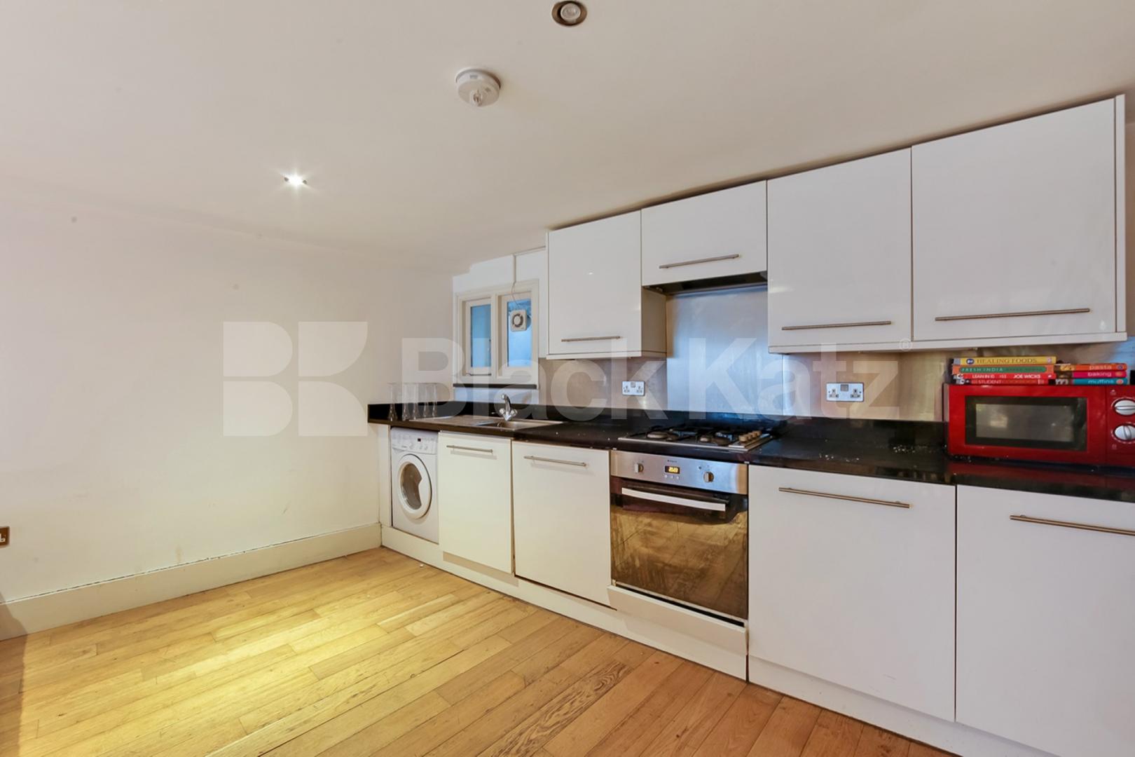 Duplex apartment with charming patio garden   Summerley Street, Earlsfield